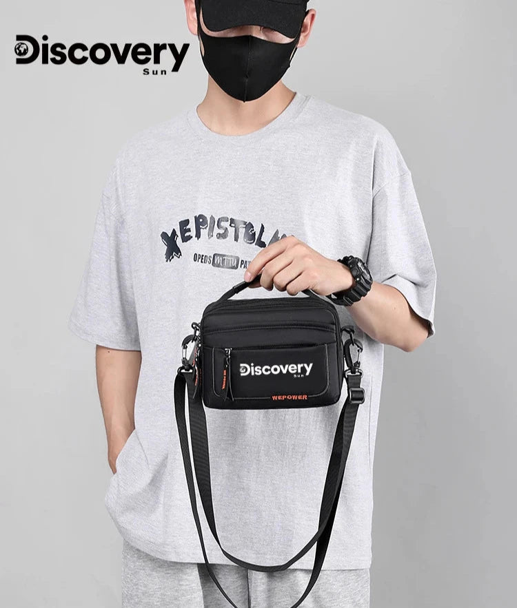 Bolsa de Ombro Discovery Adventure – Compacta e Funcional